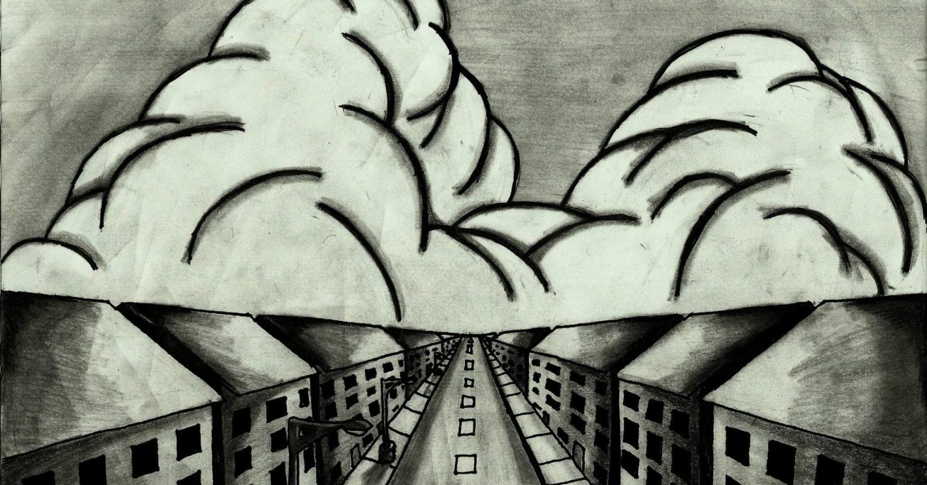 A cityscape with towering clouds looming over a road between buildings.